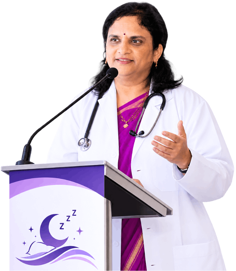 Dr. Nalini Nagalla speaking at a podium